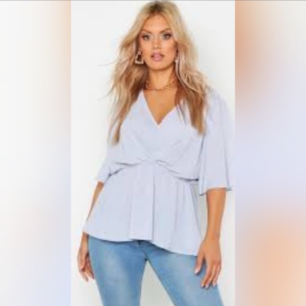 Angel Sleeve Peplum Blouse‎